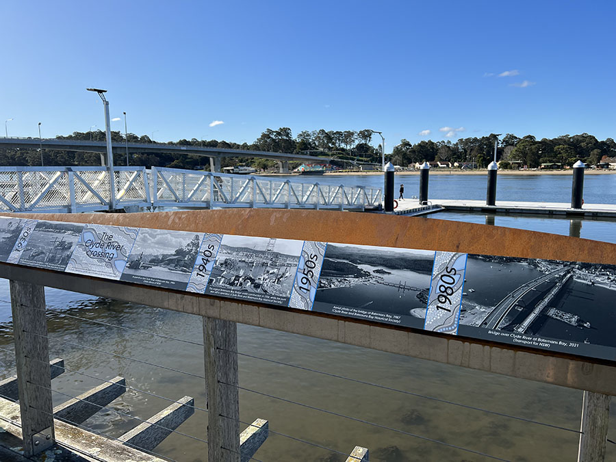 New interpretive signage panel with floating pontoon in the background