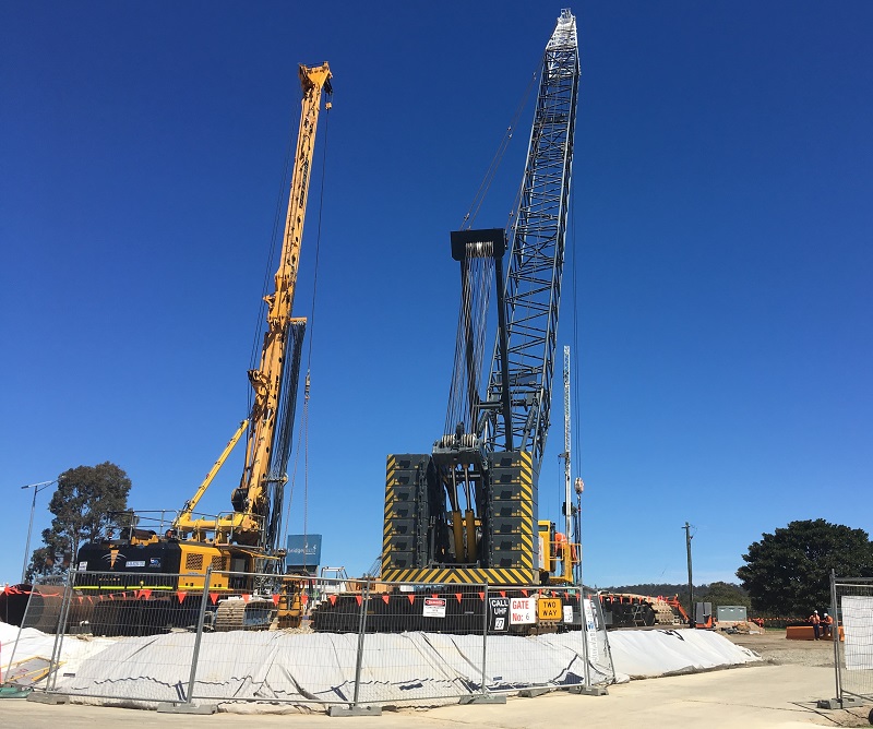 Crane and piling rig for concrete injected columns at southern bridge approach (a) 18 Oct 2019