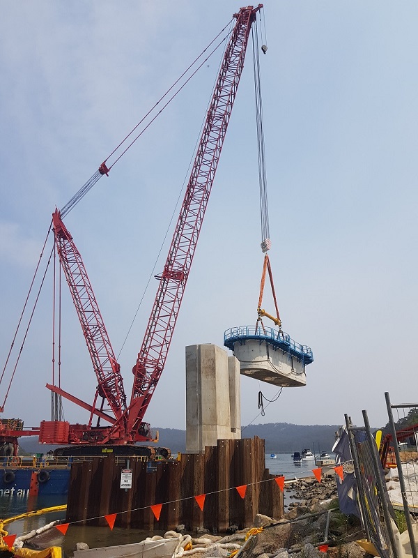 Lifting final pile cap shell onto barge for transport to pier 4 - Dec 2019 a