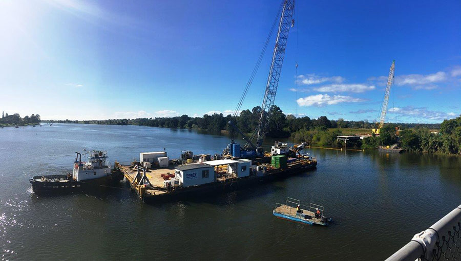 The Maeve Anne being moved into place by a tug (June 2017)