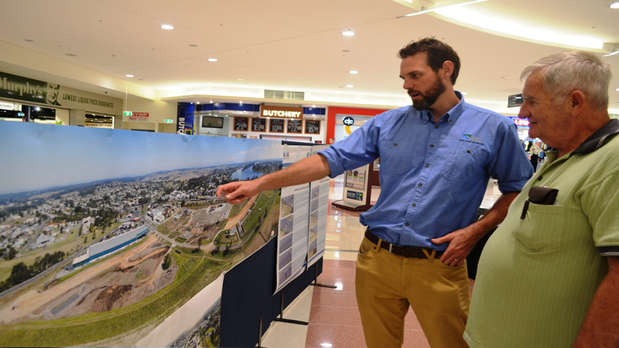 Grafton resident John Perrett speaks with a project team member during an information session (Oct