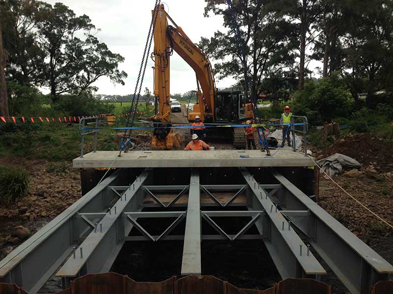 Precast concrete being placed on temporary bridge at Broughton Creek - February 2015