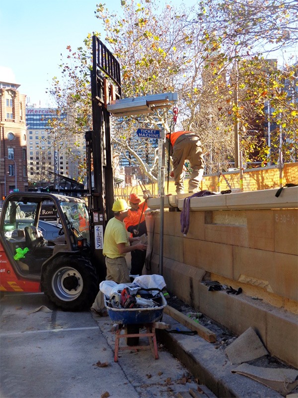 Central Station: Stone Masons restoring stone wall 2016.