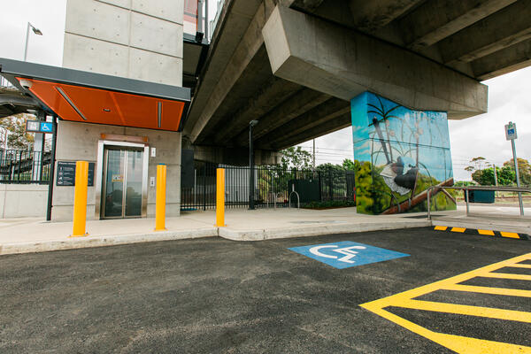 Image of accessible parking space, new lift and artwork at Fairy Meadow Station