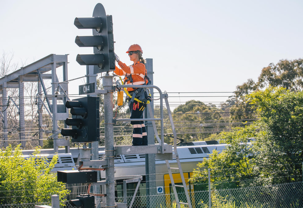 A signal electrician working on signals