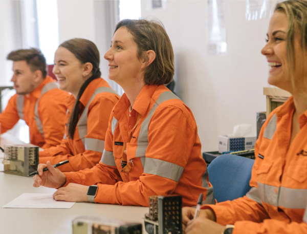 Sydney Trains apprentices in a meeting room