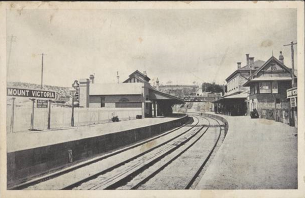 Mount Victoria Railway Station in circa 1912, after construction of the Platform 1 Station Building, the elevated signal box on Platform 2, and the footbridge.  