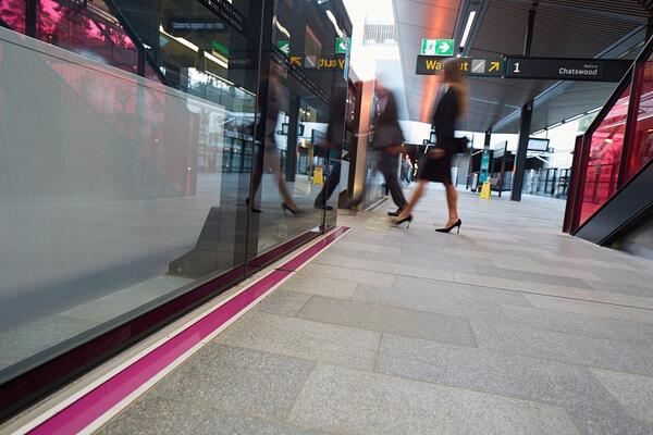 On the platform at Cherrybrook station, a blossom pink line runs embedded in the floor of the platform in front of platform screen doors. It will rise and fall as the trains arrive and depart.