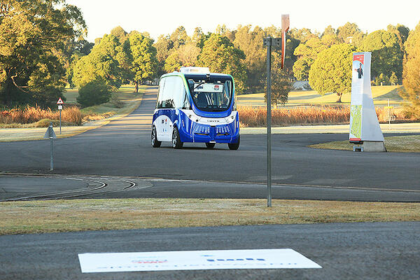 Sydney Olympic Park Smart Shuttle travelling through Newington Armory