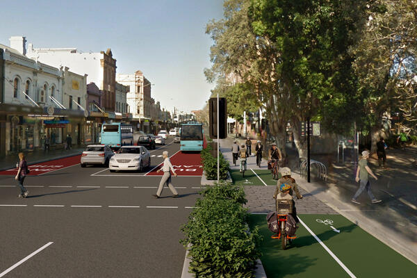 Artist’s impression (subject to change) facing east, showing the proposed cycleway on the south side of Oxford Street and crossing for people walking between Paddington Reservoir Gardens and William Street, Paddington
