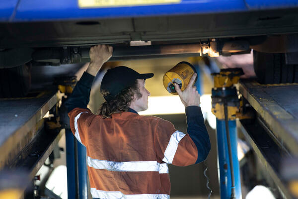 Mechanic working on a bus