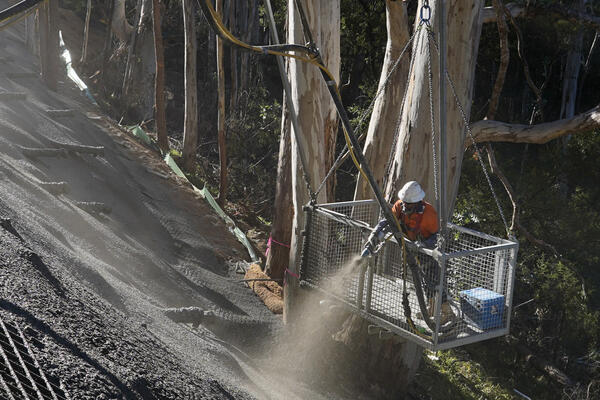 Transport for NSW Repairs were carried out under difficult conditions with workers either suspended on platforms or abseiling ropes to perform essential tasks, such as spraying a layer of concrete that will prevent erosion during future heavy rainfall events.