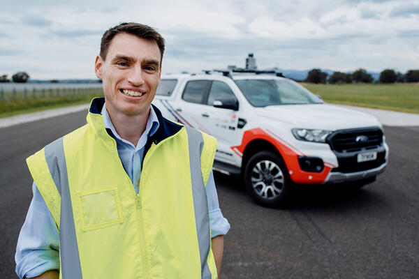 Transport for NSW FMRTC team member in front of Dubbo ute.