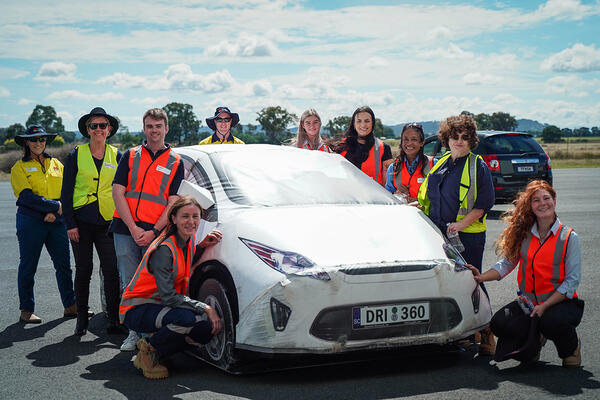 Transport for NSW staff with crash test vehicle model