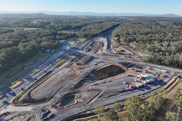 Transport for NSW An aerial view of the Jervis Bay Road intersection upgrade under construction looking from the South East June 2025.