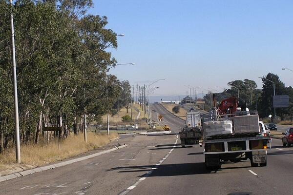 Looking west on the Great Western Highway at Prospect, showing the former left turn lanes to the westbound freeway.