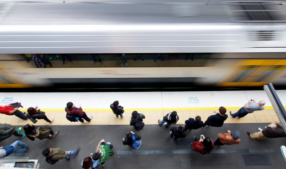 Transport for NSW train travelling past station.