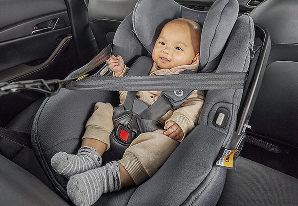 Baby in a child car seat