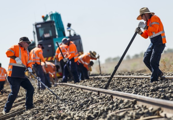 Workers doing trackwork on a country rail network